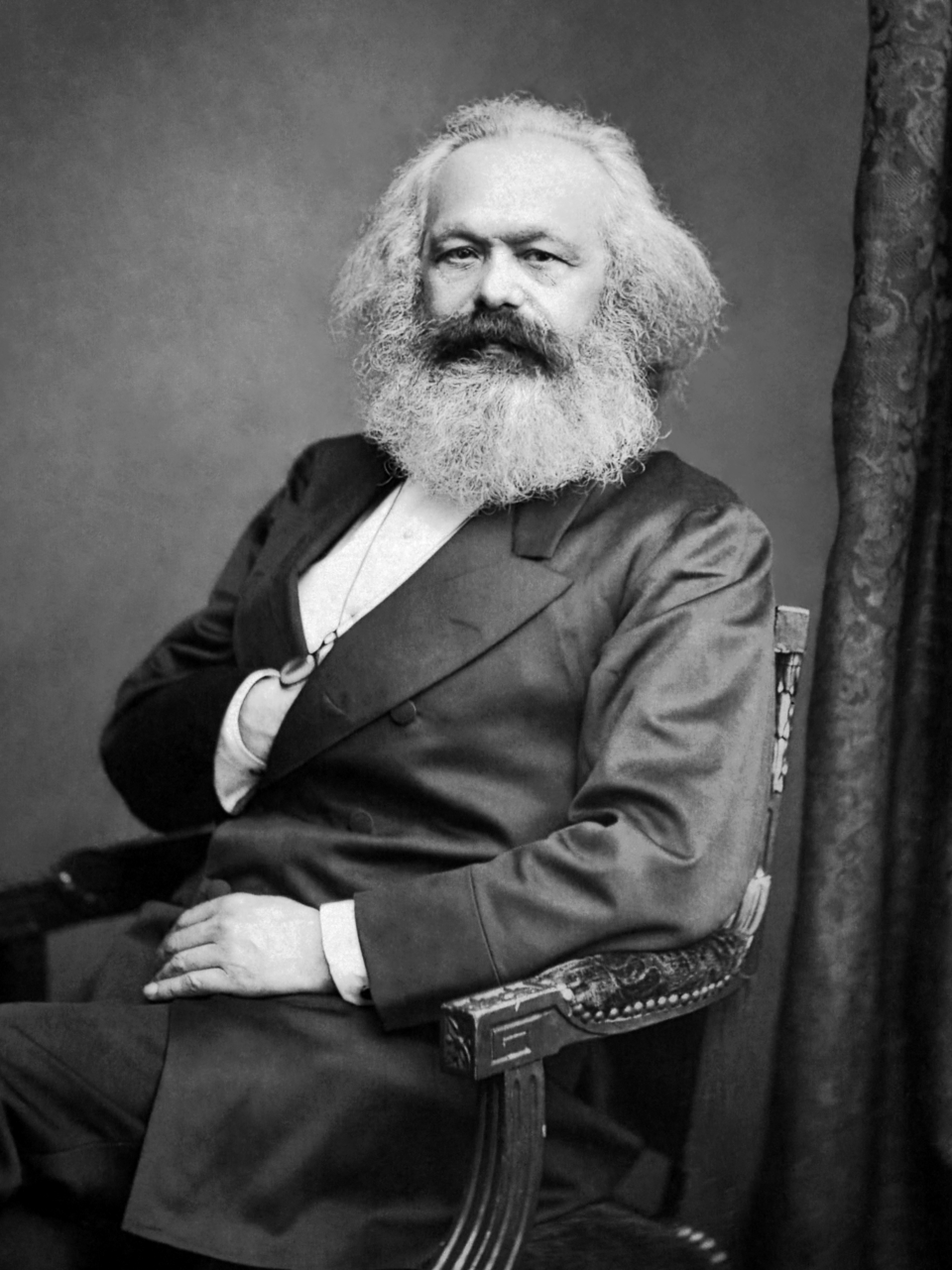 A portrait of Karl Marx.